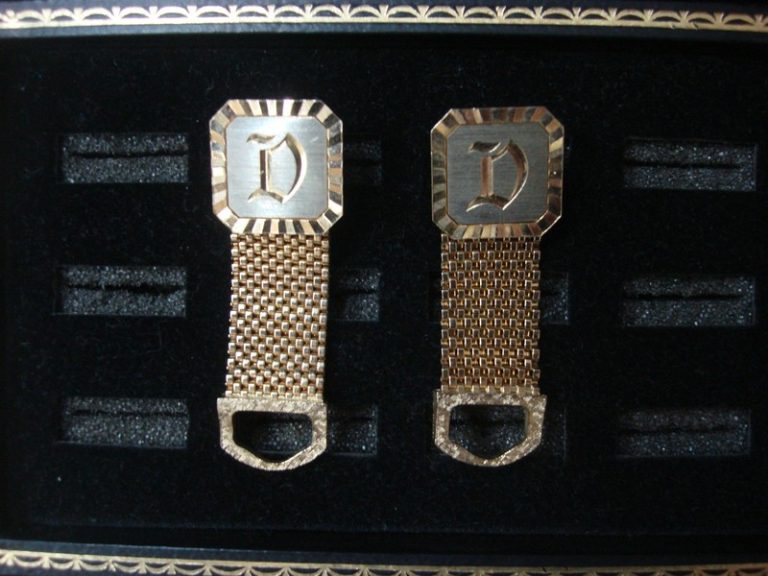 Vintage gold tone wrap-around cufflinks with 'D' initial