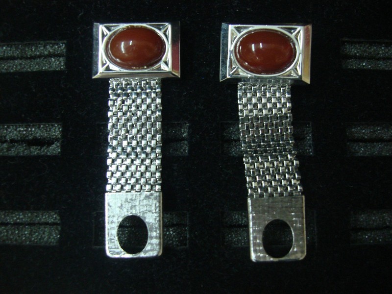 Vintage silver tone wrap-around cufflinks with reddish-brown stones