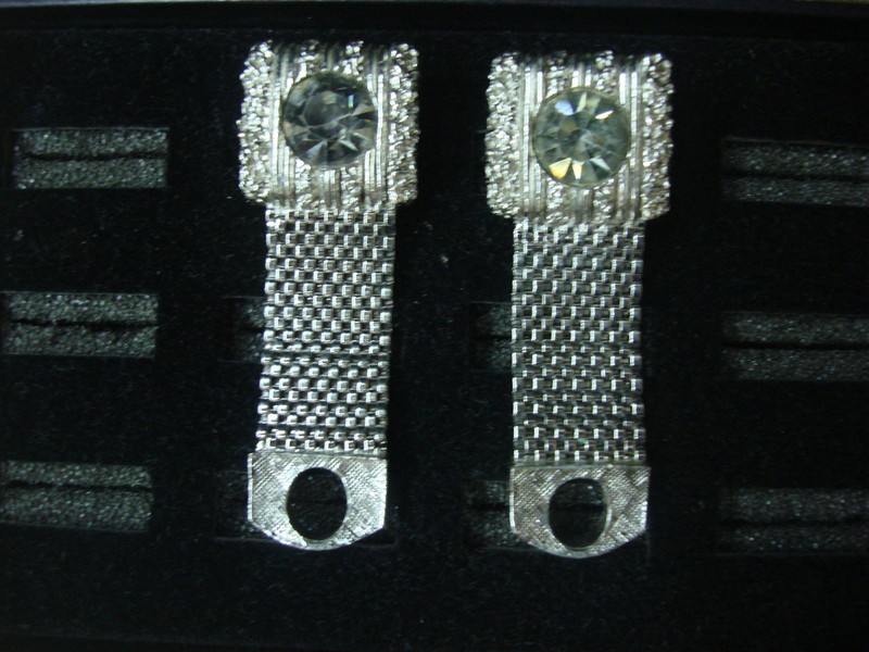 Vintage Swank wrap-around cufflinks in silver tone with clear stones