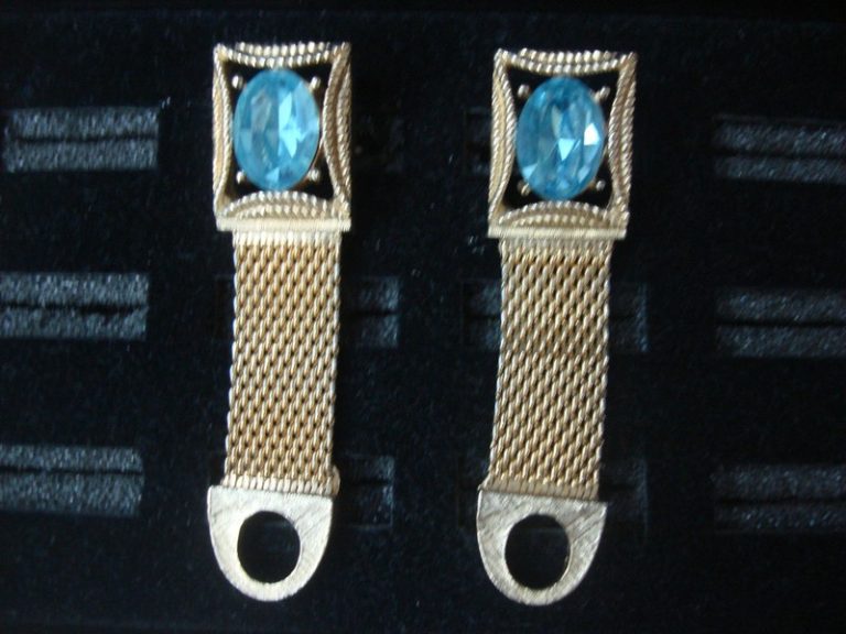 Vintage gold tone wrap around cufflinks with blue stones