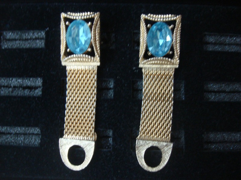 Vintage gold tone wrap around cufflinks with blue stones