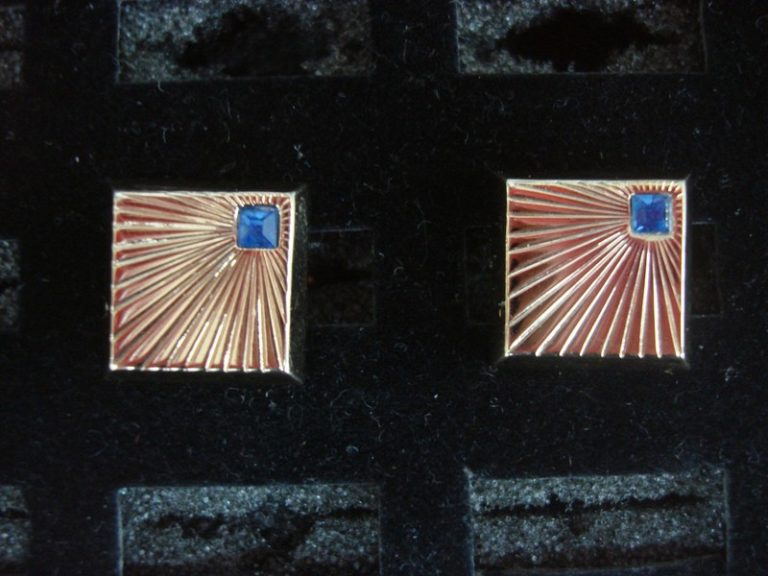 Vintage gold-tone cufflinks with blue stones