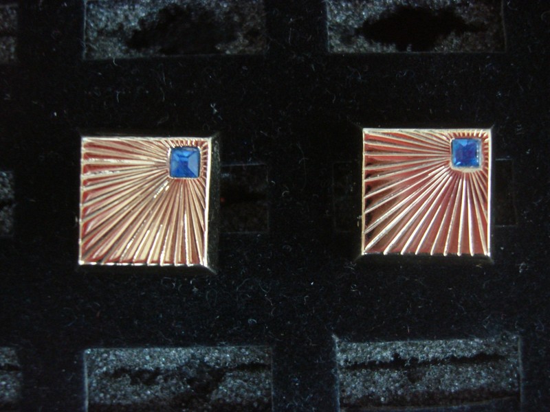 Vintage gold-tone cufflinks with blue stones