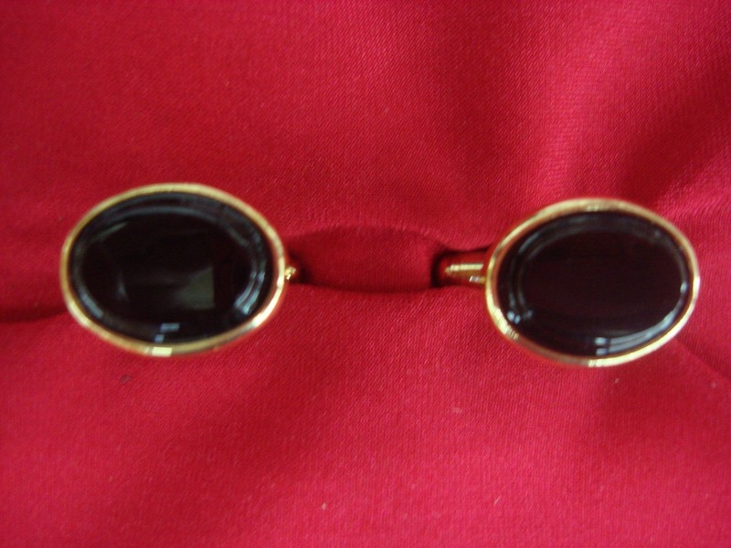 Vintage gold-tone cufflinks with black stones
