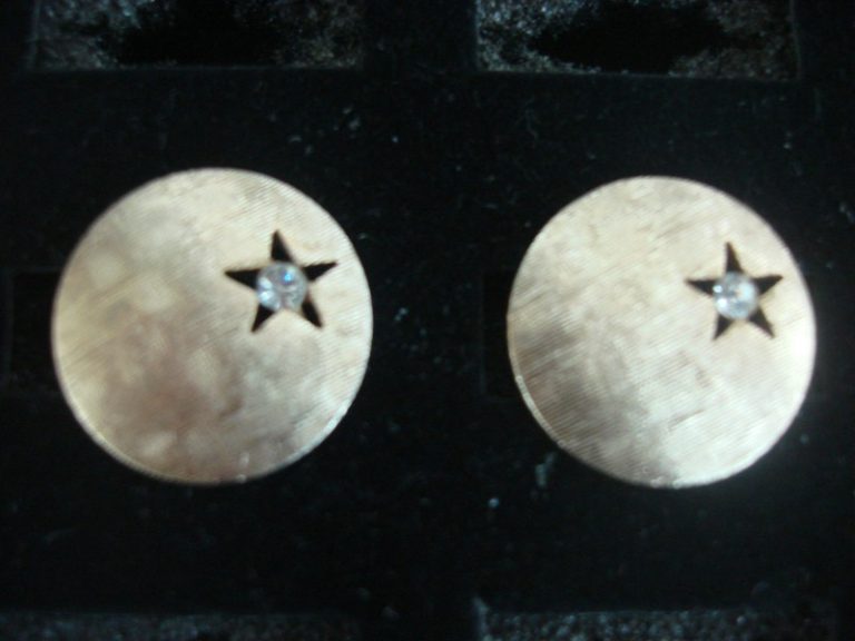 Vintage Swank gold-tone cufflinks with star-shaped clear stones