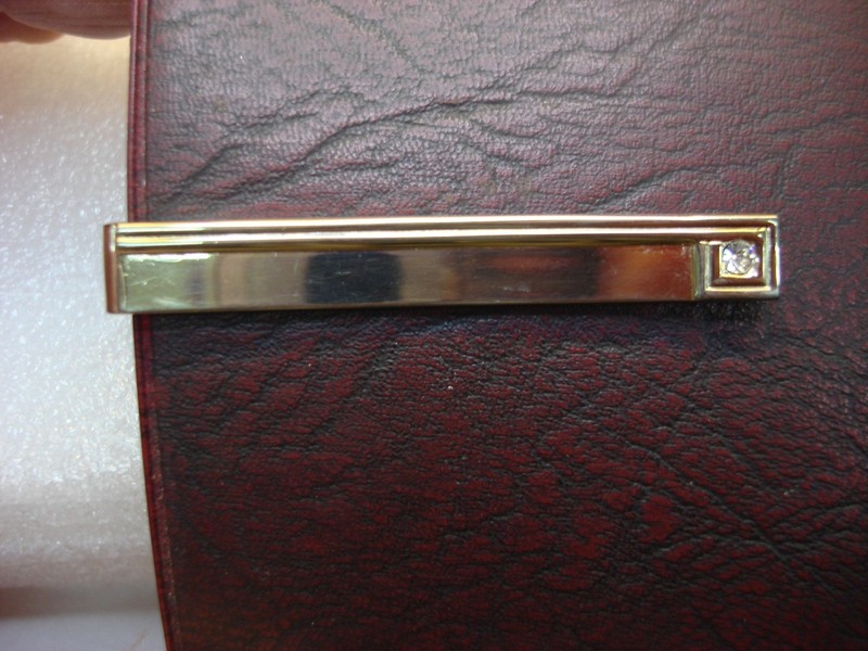 Vintage Swank gold-tone tie clip with simulant diamond