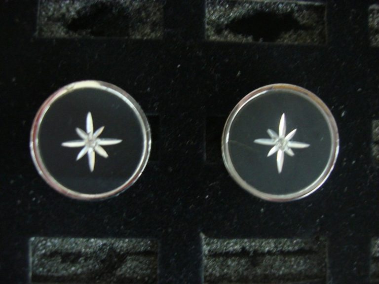 Vintage Anson silver-tone cufflinks with starburst design and clear stone