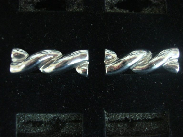 Vintage Swank silver-tone cufflinks, model #115, in excellent condition.
