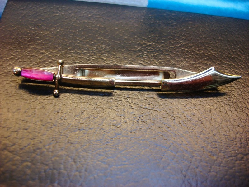 Vintage gold tone tie clip with sword fish design