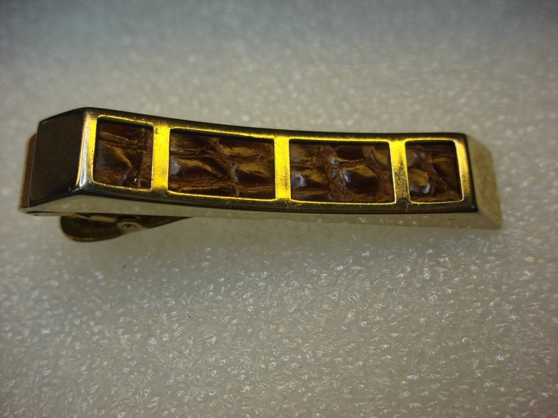 Vintage gold-tone tie clip with alligator hide insert