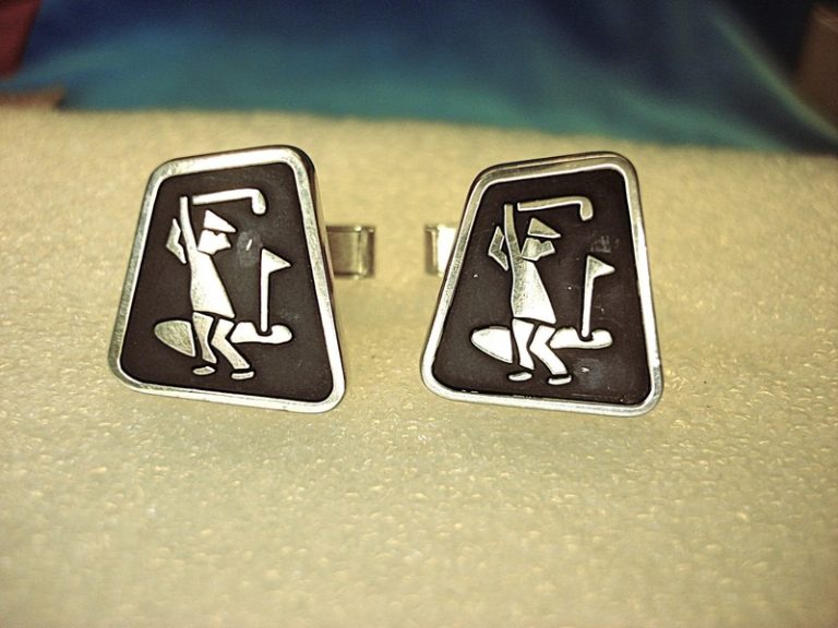 Vintage gold-tone golf cufflinks with golfer design