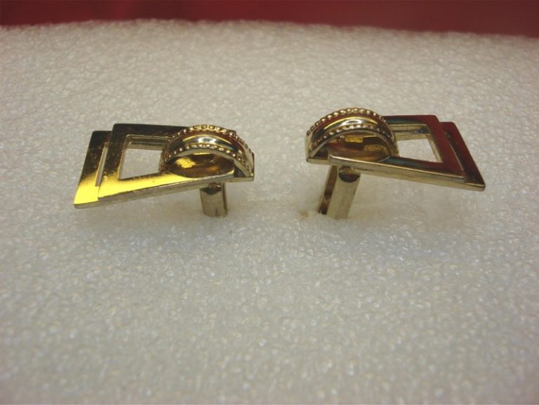 Vintage gold-tone cufflinks with an intriguing design