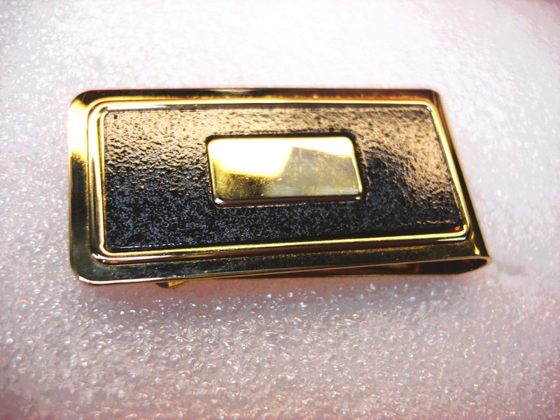 Vintage gold-tone money clip with slate blue insert