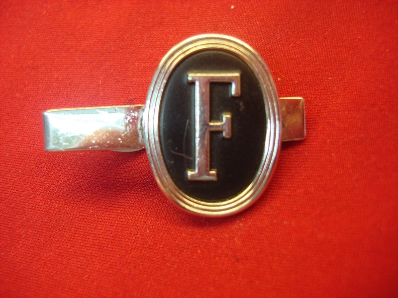 Vintage Swank silver-tone tie clip with initial F
