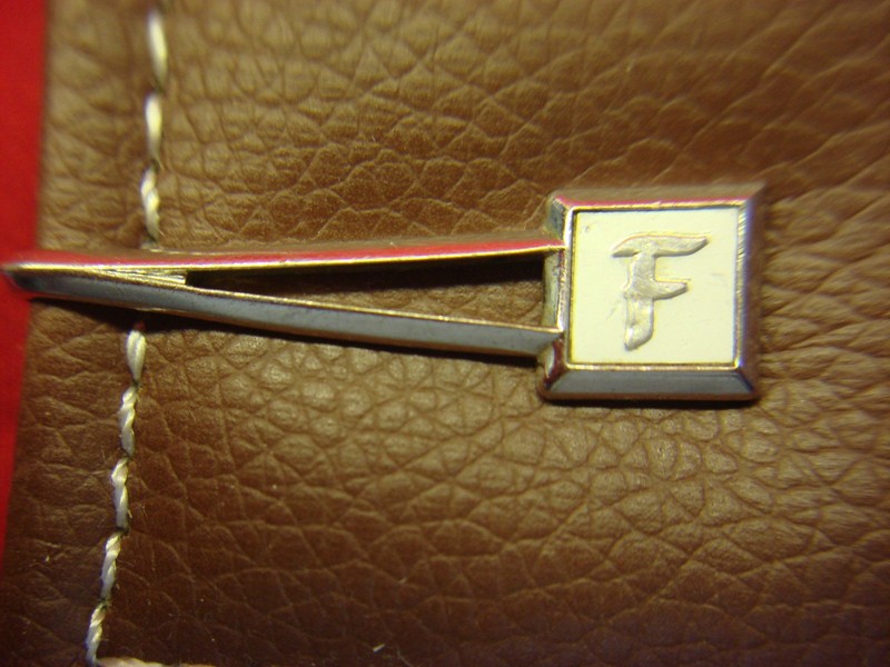Vintage Swank silver-tone tie clip with initial F