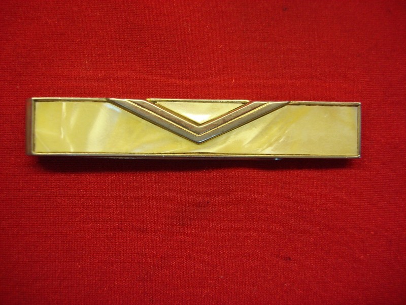 Vintage Swank gold-tone tie clip with mother of pearl inlay