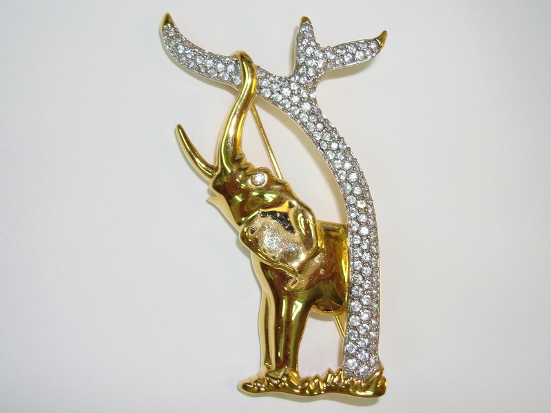 Vintage Swarovski crystal elephant brooch, SCS hallmark, radiant gold-tone