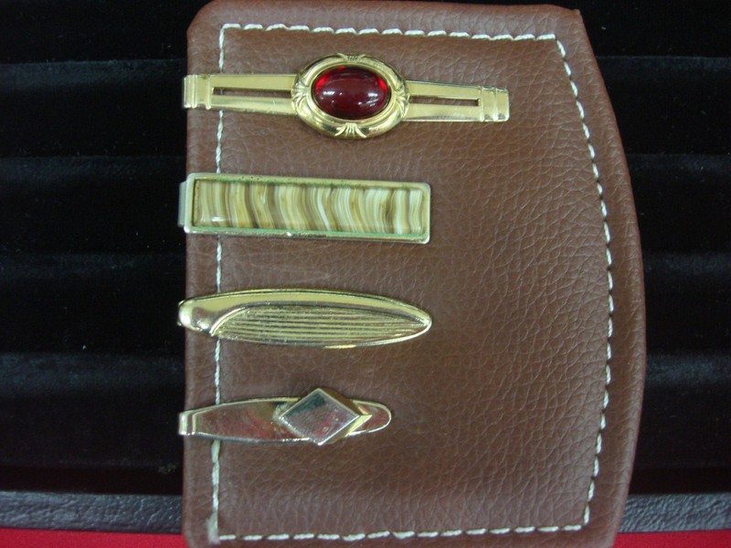 Set of four vintage gold-tone tie clips, unique and unusual design