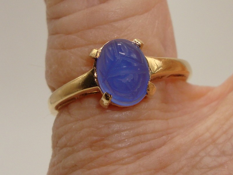 14K gold ring with a carved blue onyx scarab