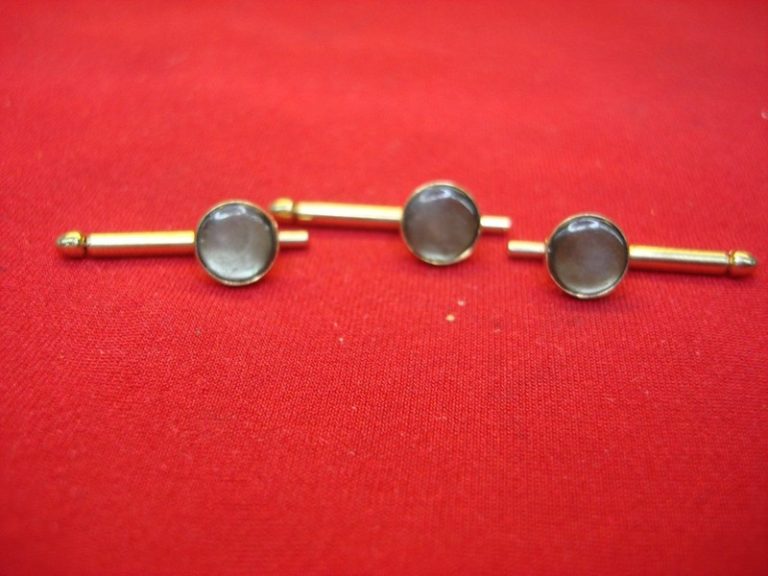 Vintage Swank mother-of-pearl shirt studs in gold tone
