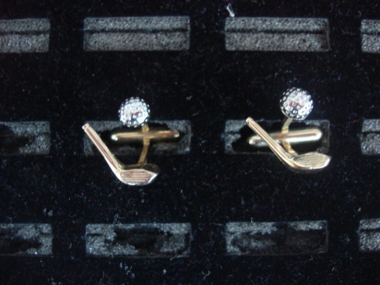 Vintage gold and silver-tone golf cufflinks with a unique club and ball design