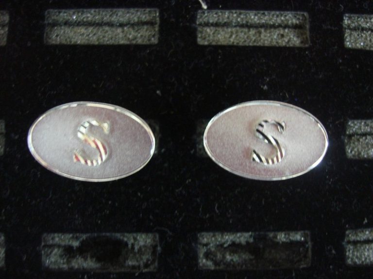 Vintage Dante silver tone cufflinks with a unique 'S' design