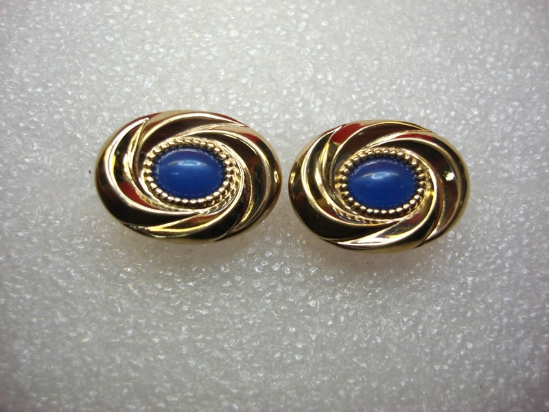 Vintage gold-tone cufflinks with blue stones