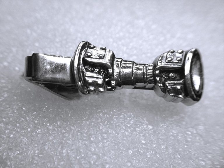 Vintage silver-tone drive shaft tie clip with articulated joints