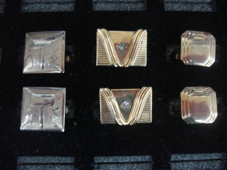 Vintage gold-tone cufflinks in a set of three unique pairs