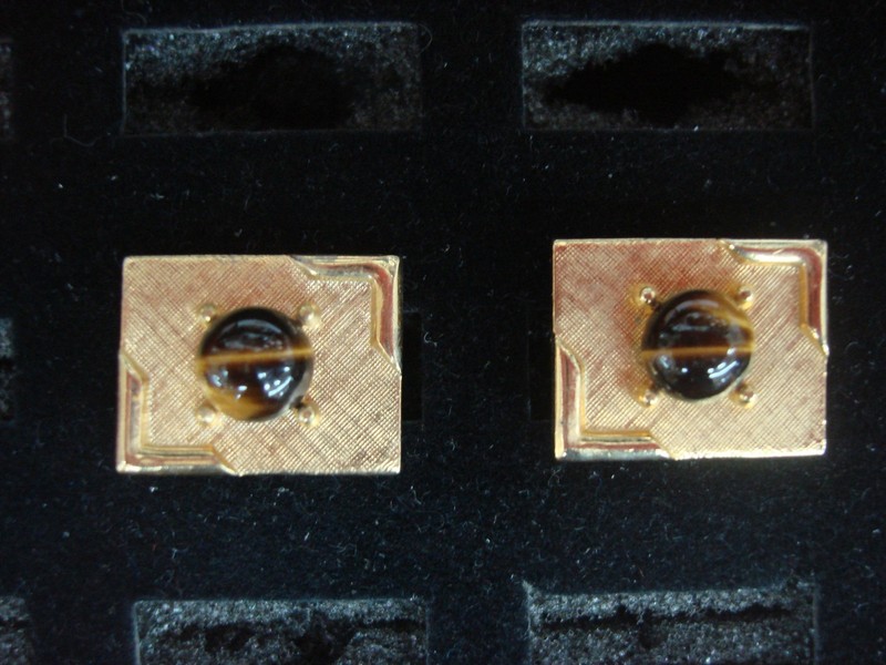 Vintage gold-tone cufflinks with cat's eye accents