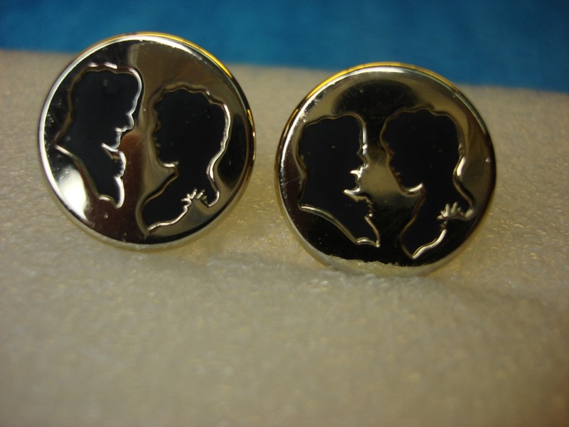 Vintage gold-tone cufflinks with man and woman silhouettes