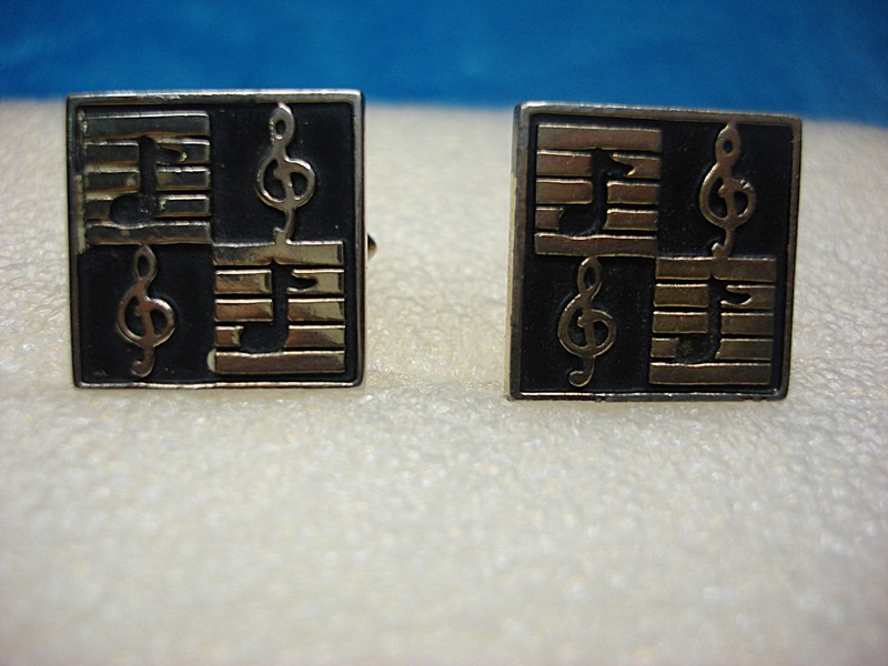 Vintage Swank gold-tone cufflinks with musical notes and black enamel detailing