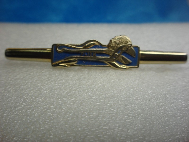 Vintage gold-tone tie clip featuring Plion Wrench Co. and Proto Tools logos, enamel accents, slight enamel loss.