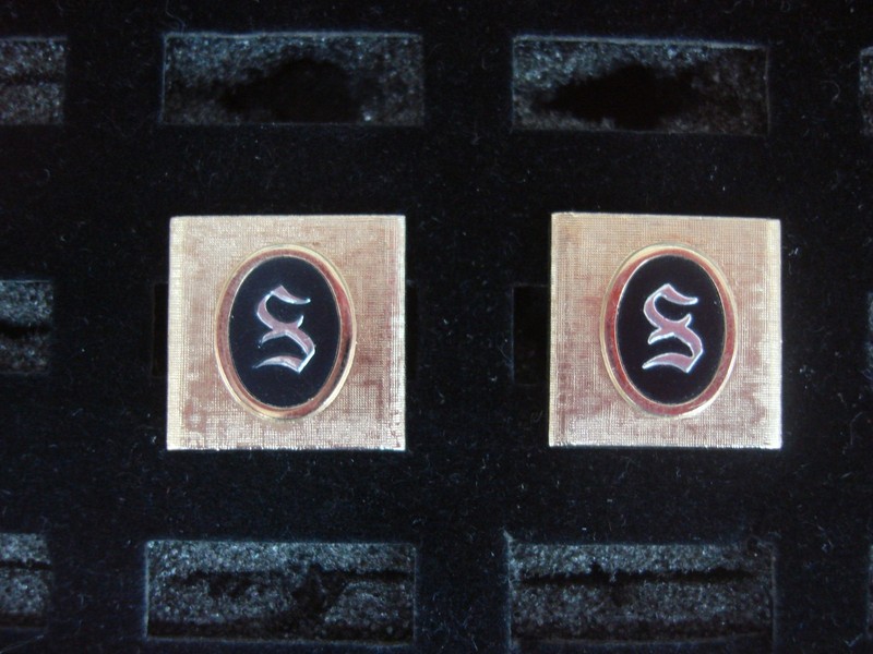 Vintage Swank gold-tone cufflinks with an 'S' initial design