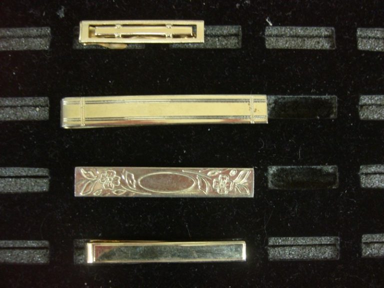 Set of four vintage gold-tone tie clips