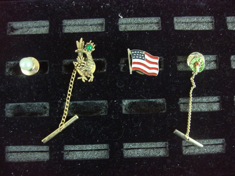 Set of four vintage gold-tone tie tacks or lapel pins