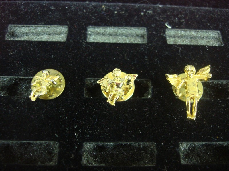 Vintage set of three gold-tone cherub tie tacks or lapel pins