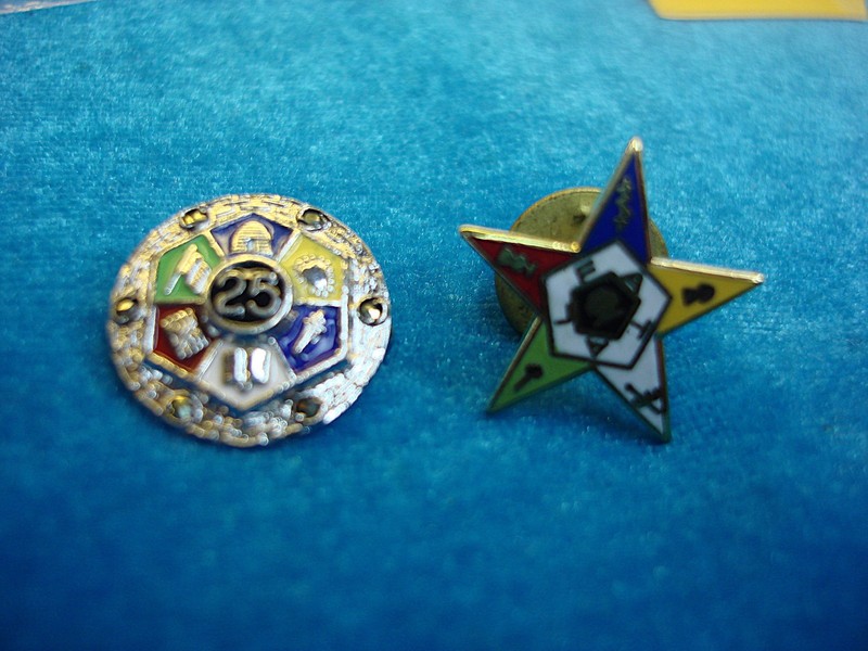 Two vintage Eastern Star pins, one with a pinback closure and one with a clutchback fastening. Both pins are in excellent condition.