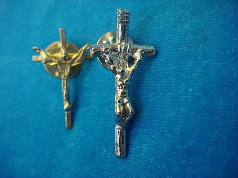 Vintage gold and silver tone crucifix lapel pins, a unique pair in excellent condition.