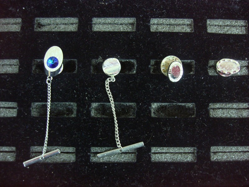 Set of four vintage silver-tone tie tacks or lapel pins