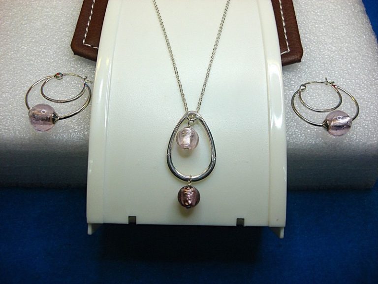 Sterling silver jewelry set with pink stones