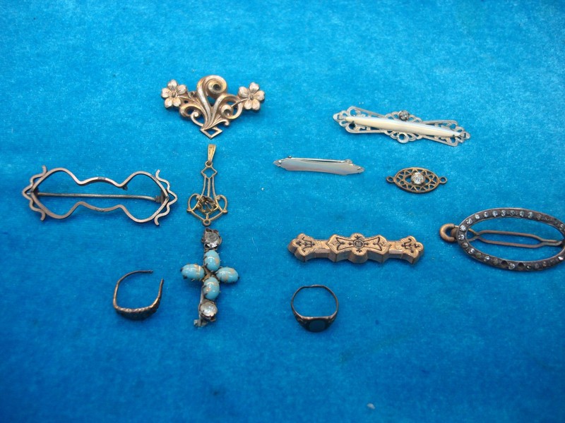 Collection of vintage gold-tone jewelry from an estate sale