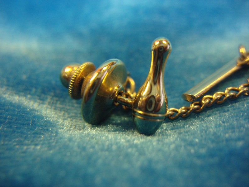 Vintage gold-tone bowling pin tie tac/lapel pin
