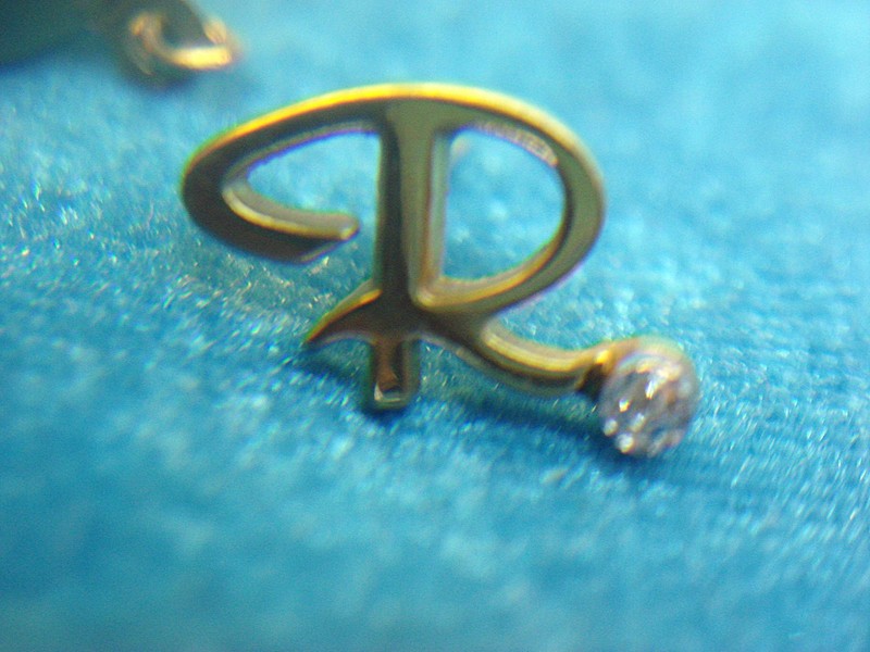 Vintage gold-tone initial 'R' tie tack with diamond accent