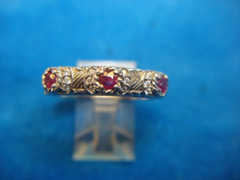 Judith Ripka sterling silver ring with rubies and CZs, size 10