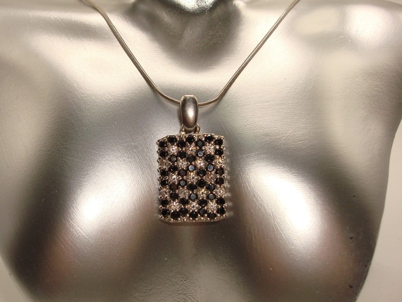 Sterling silver pendant necklace with black and white cubic zirconia stones