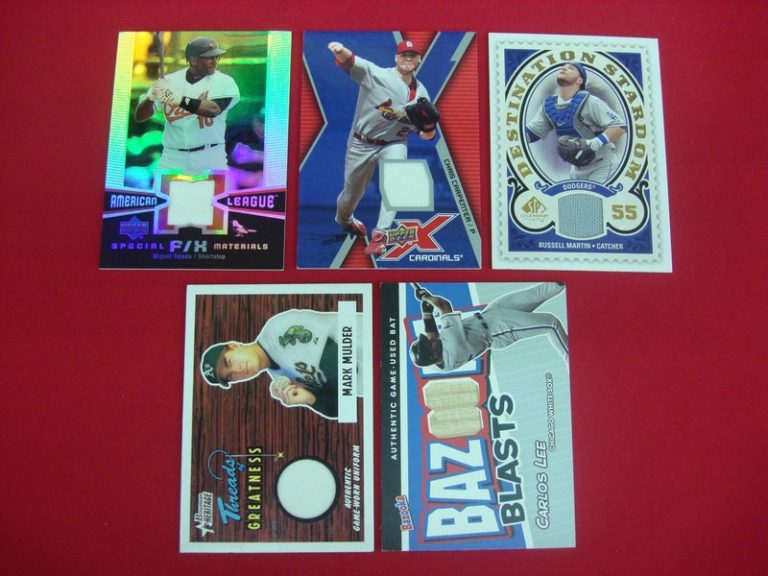 Five game-used relic baseball cards featuring Miguel Tejada, Chris Carpenter, Carlos Lee, Russell Martin, and Mark Mulder