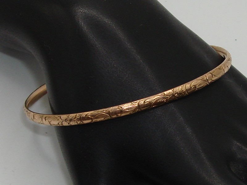 Antique Art Nouveau rose gold filled bangle bracelet with floral design