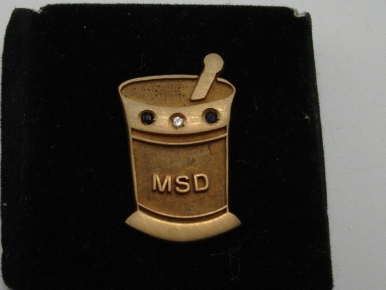 Vintage Merck, Sharp & Dohme (MSD) Mortar & Pestle Tie Tac - Blue Topaz Award