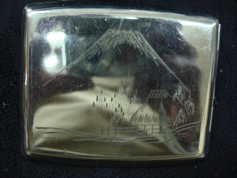 Vintage engraved cigarette case with an oriental mountain scene, stainless steel or nickel